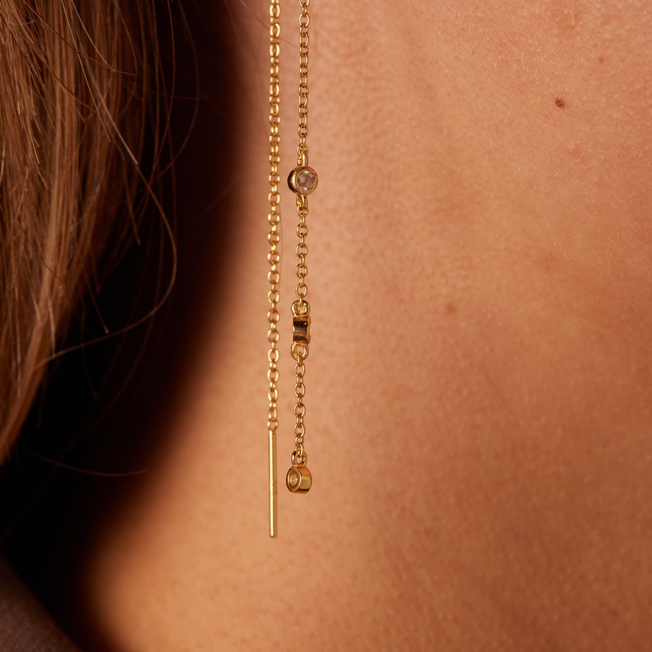 Zilveren goldplated doortrek oorbellen met zirkonia voor dames