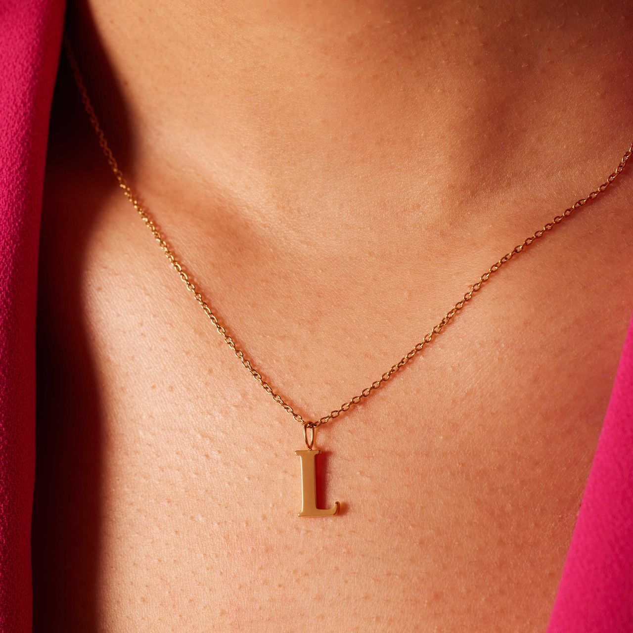 Stalen goldplated ketting met letterhanger L voor dames