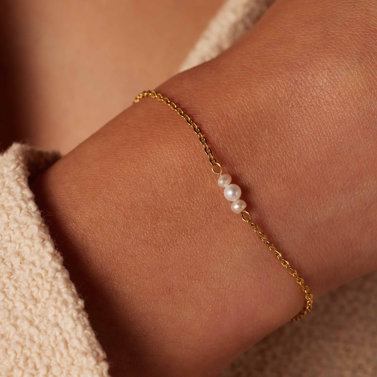 Stainless steel goldplated fantasiearmband met parel voor dames