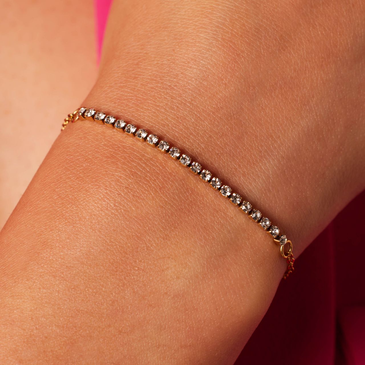 Tennisarmband aus Edelstahl, vergoldet, mit Strassbesatz