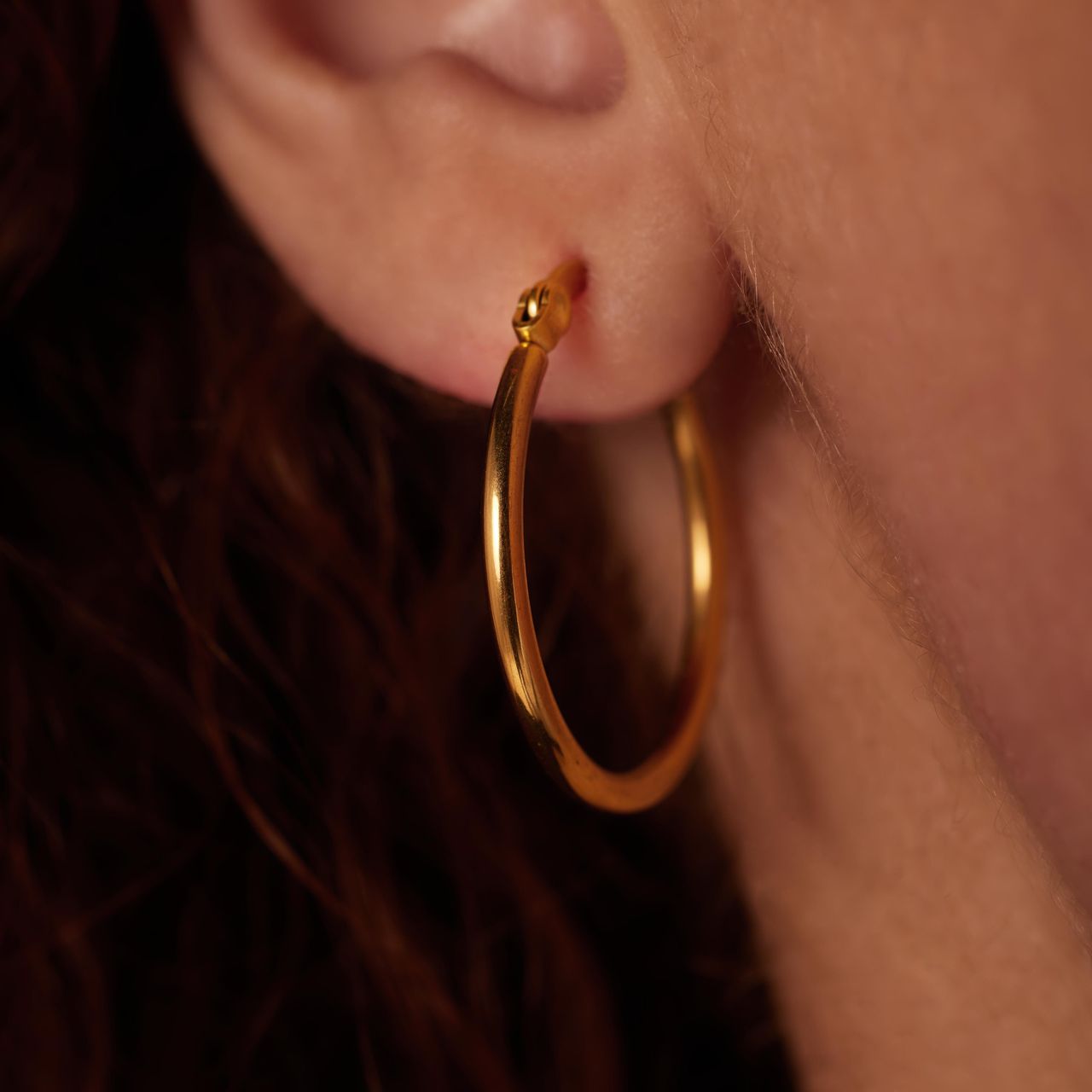 Stainless steel goldplated oorringen 25mm voor dames