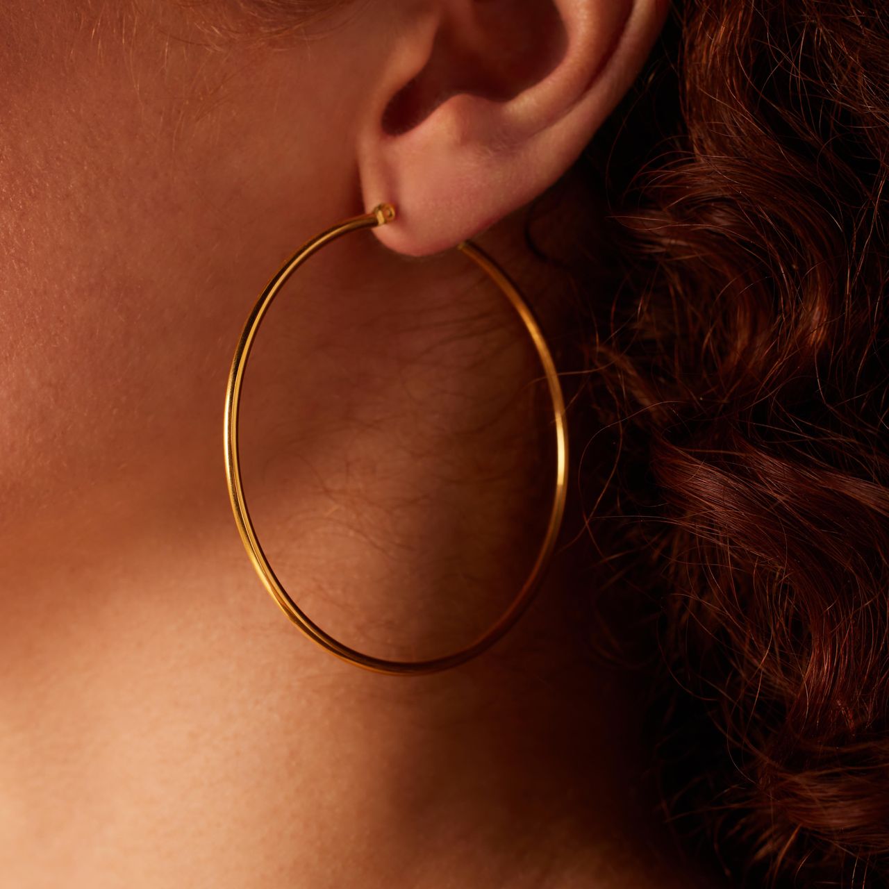 Stainless steel goldplated oorringen 60mm voor dames