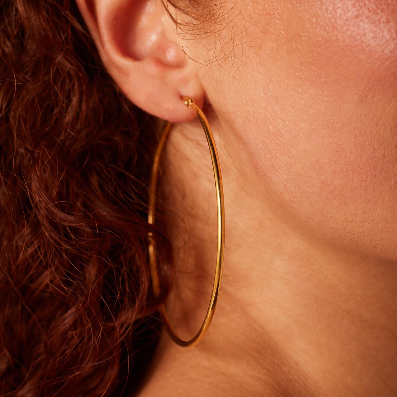 Stainless steel goldplated oorringen 70mm voor dames
