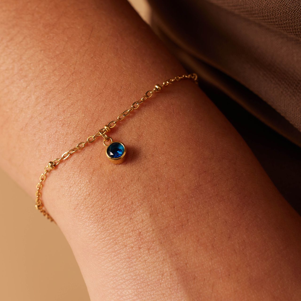 Stalen goldplated armband geboortesteen december