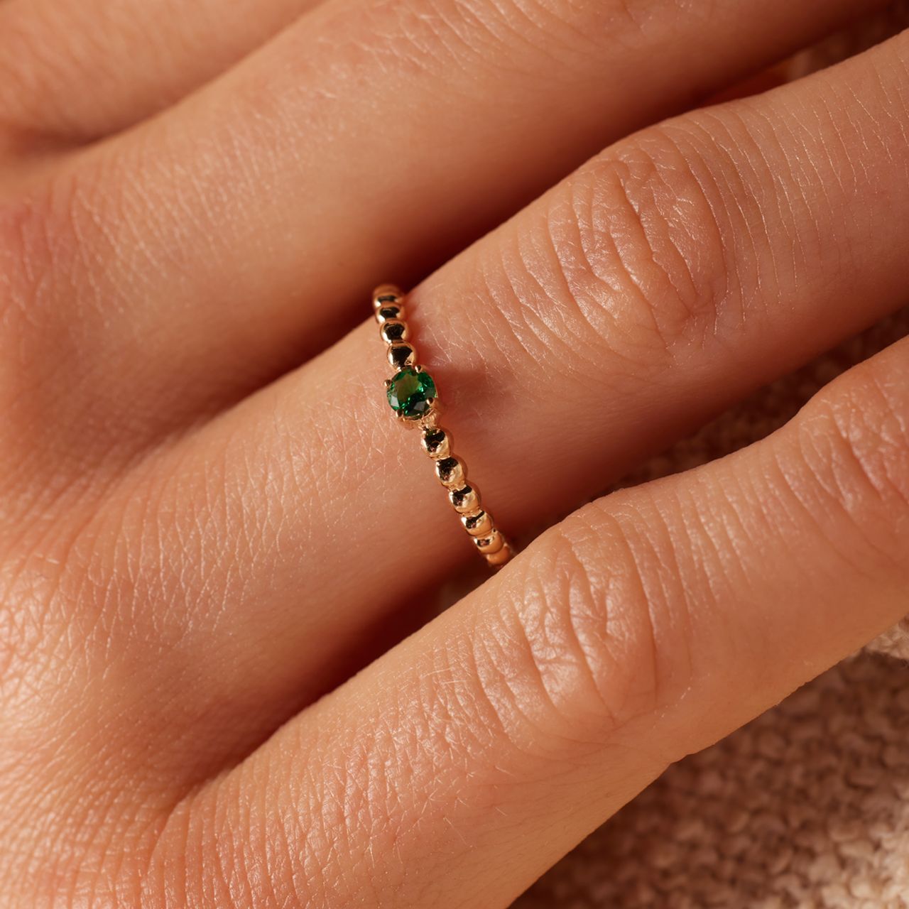 Ring, 375er Gelbgold, mit grünem Zirkonia