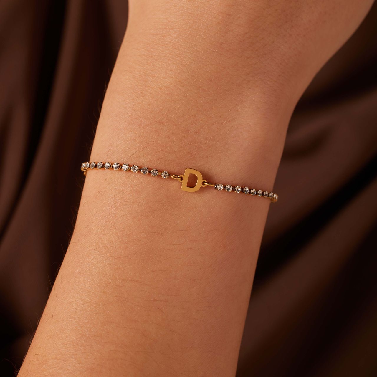 Stalen goldplated fantasiearmband met letterhanger D met zirkonia voor dames