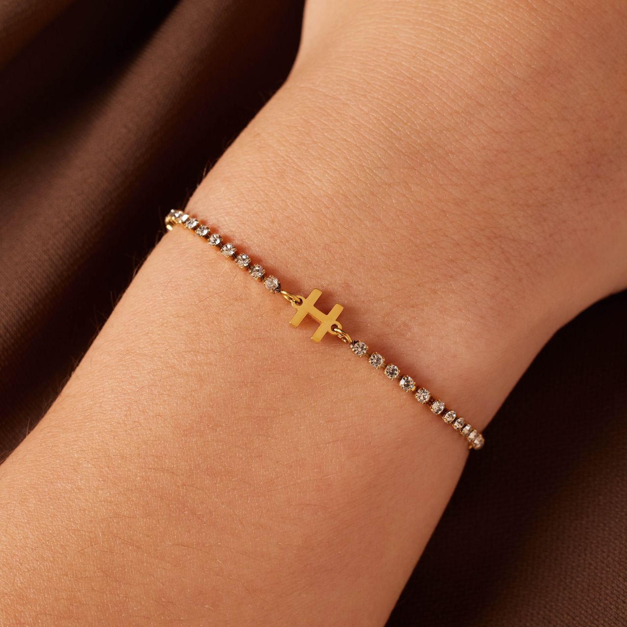 Stainless steel goldplated tennis armband wit cz letter - H