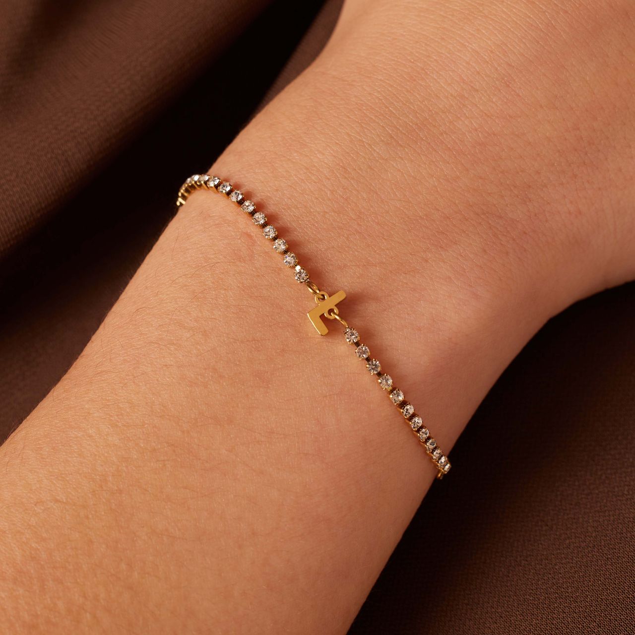 Stainless steel goldplated tennis armband wit cz letter - L
