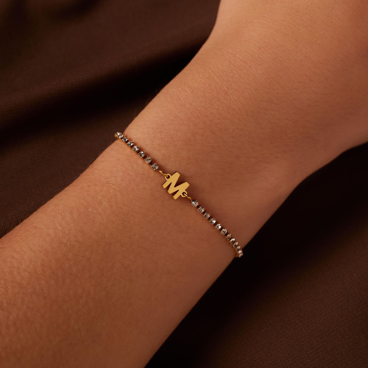 Stalen goldplated tennis armband wit cz letter - W