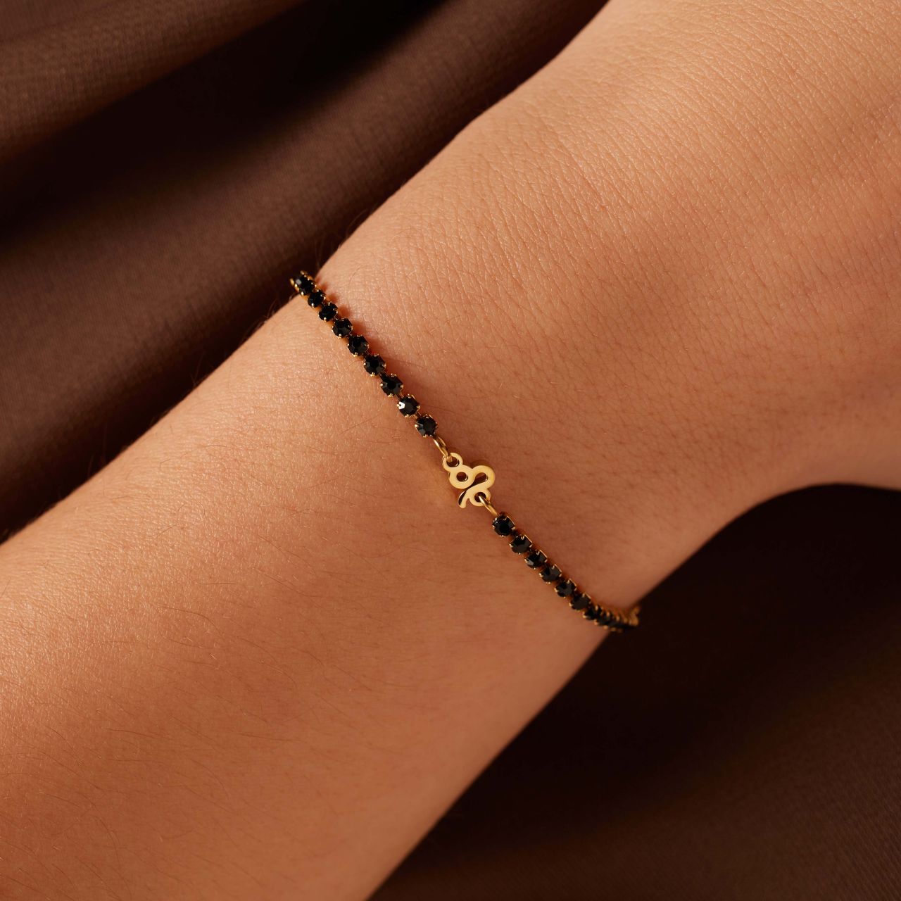 Stainless steel goldplated tennis armband Leeuw/Leo
