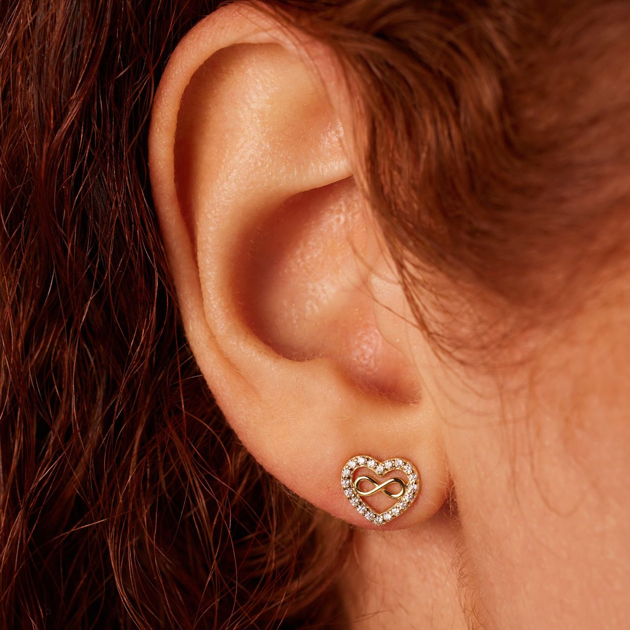 Zilveren goldplated oorknoppen hart infinity zirkonia voor dames