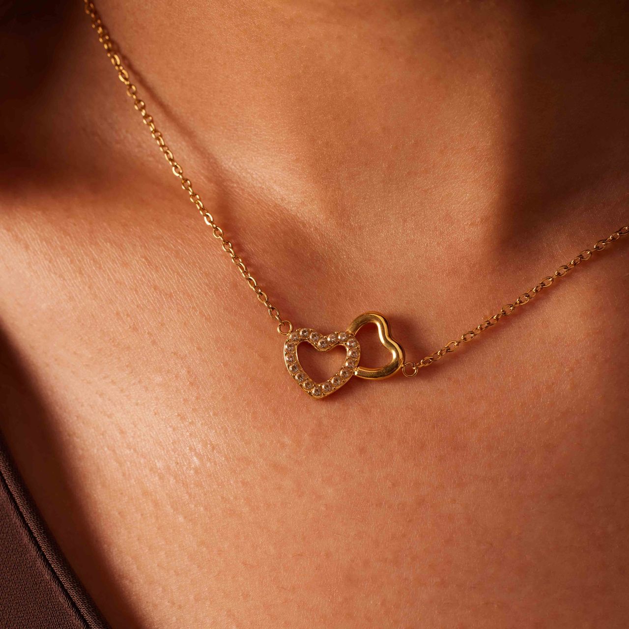 Stainless steel goldplated ketting met open hart zirkonia