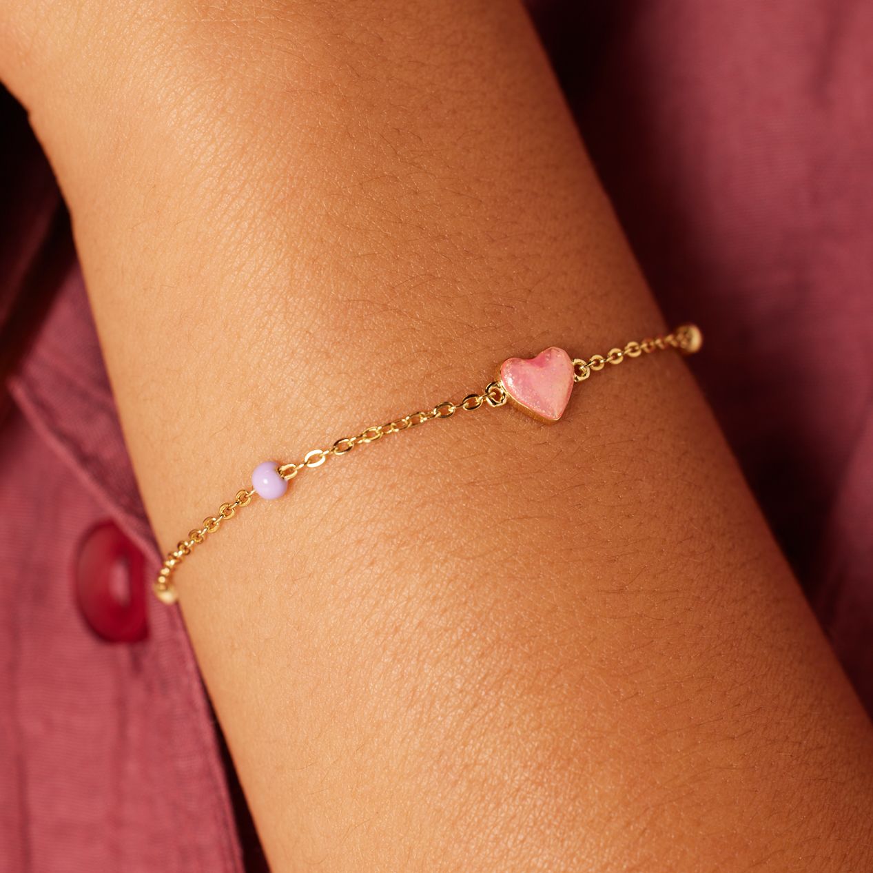 Zilveren goldplated armband met roze hartje