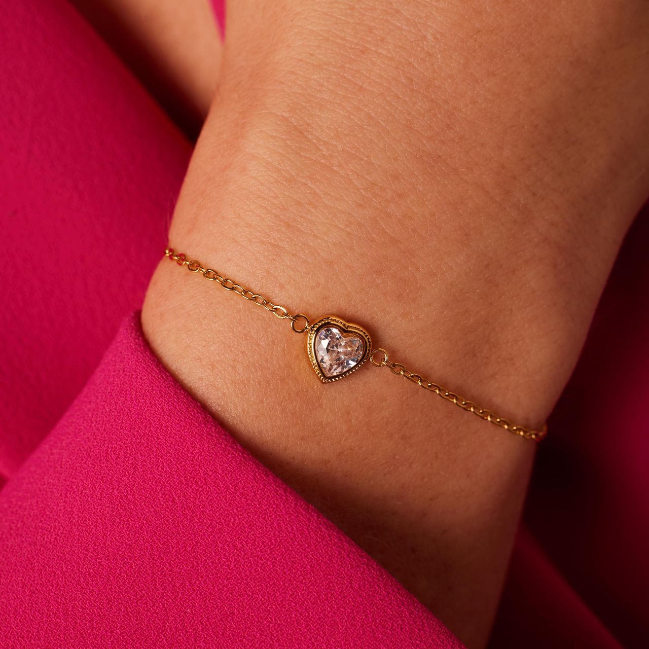 Stainless steel goldplated fantasiearmband met hanger hart met zirkonia voor dames