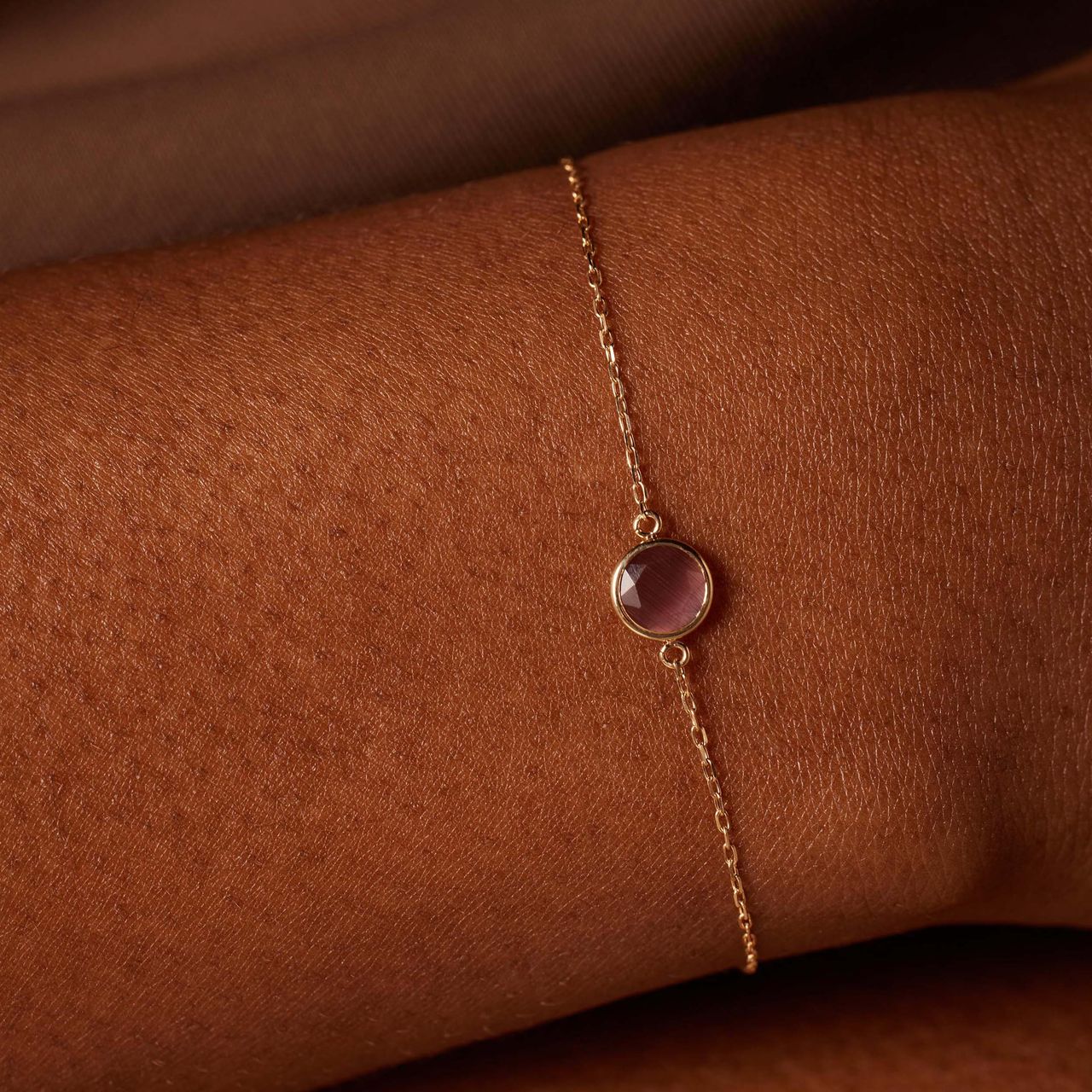 Armband aus 585 Gelbgold mit Geburtsstein-Anhänger, Juni