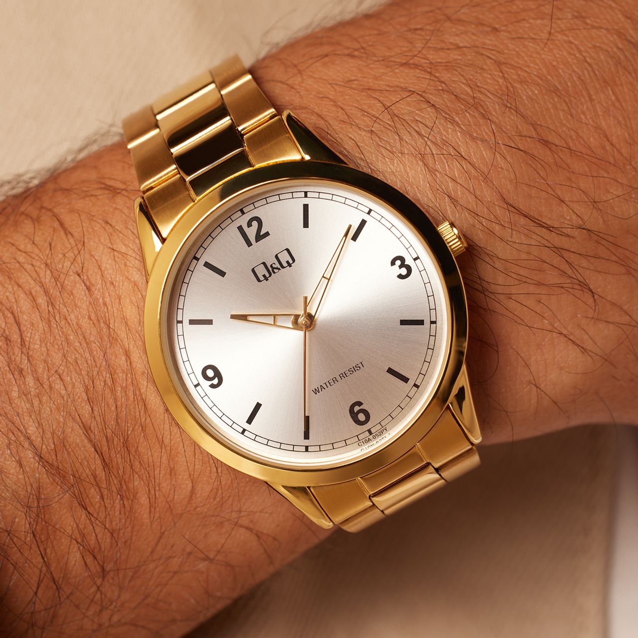 Q&Q Herrenarmbanduhr aus goldfarbenem Edelstahl C10A-052PY