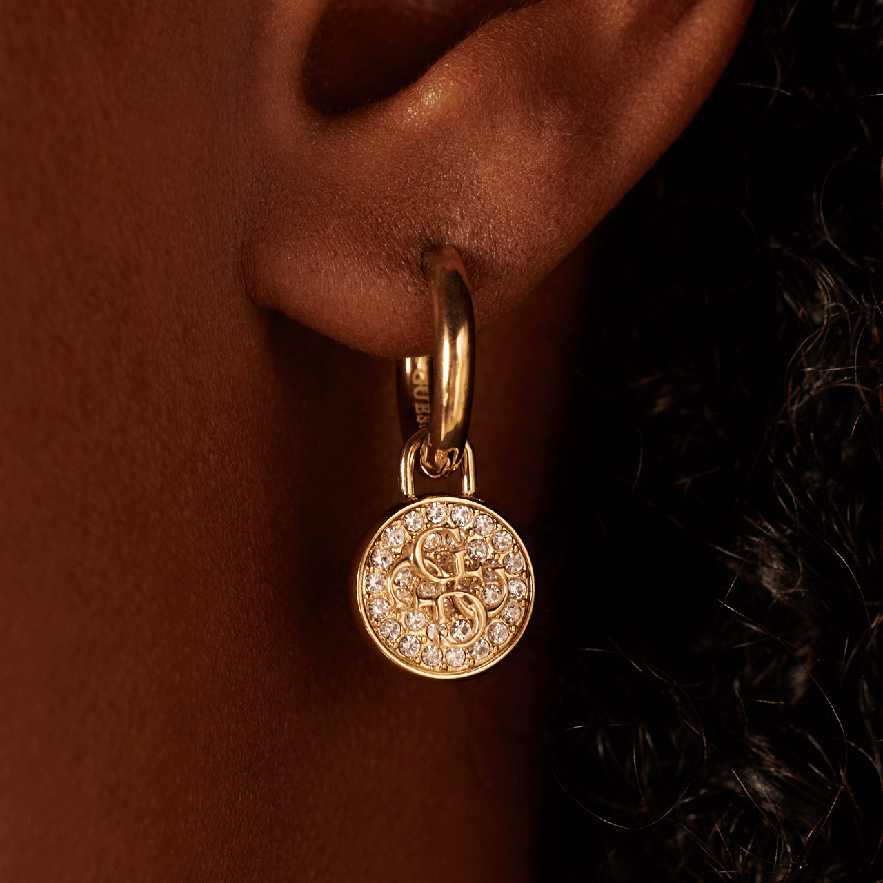 Guess stainless steel goldplated oorringen met hanger met kristal voor dames