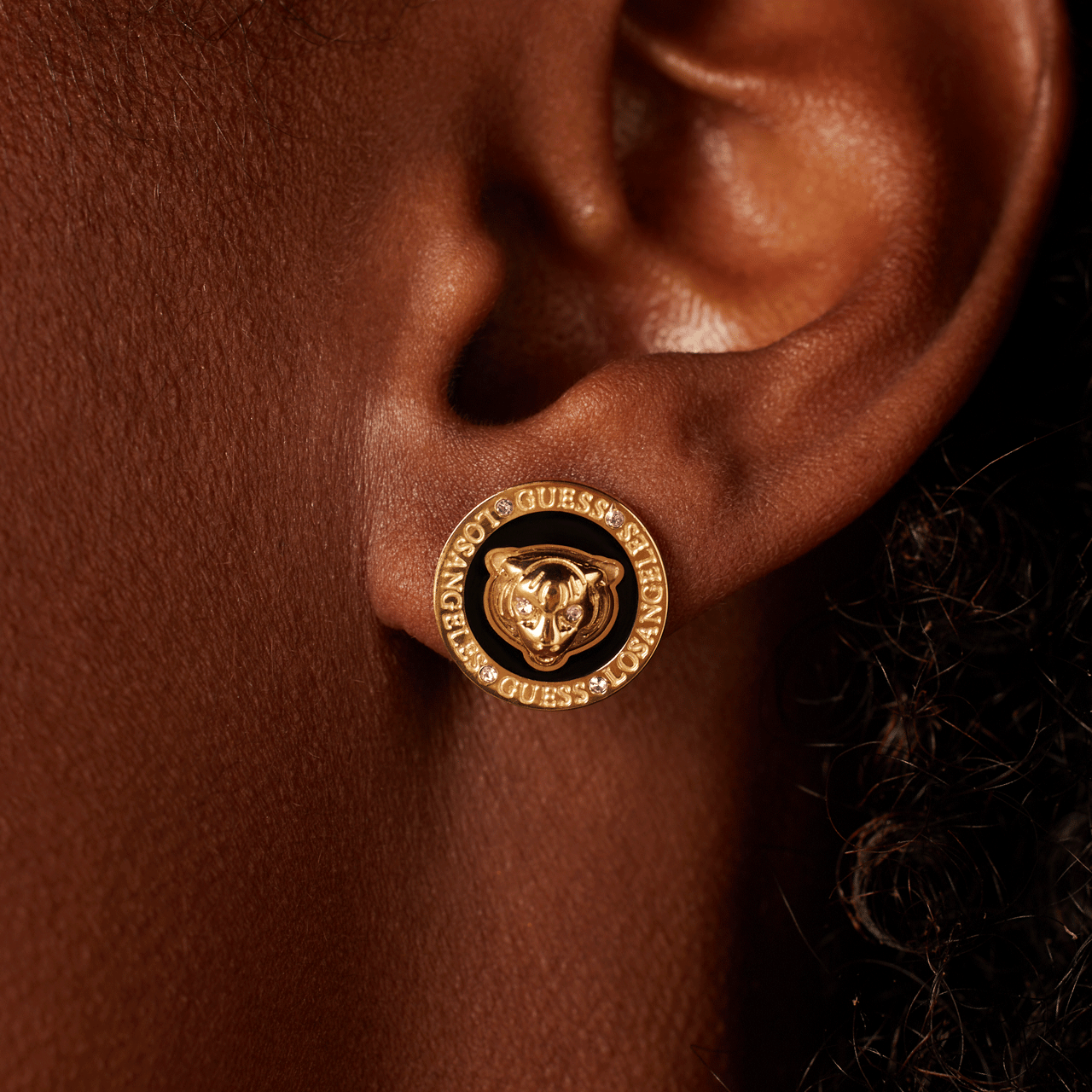 Guess stalen goldplated oorknoppen met kristal voor dames