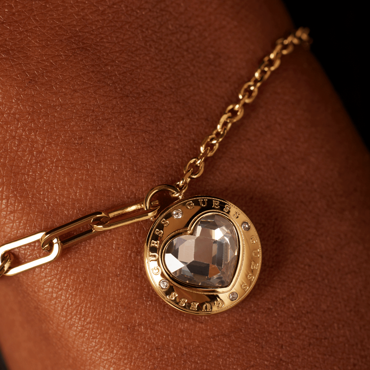 Guess stalen goldplated schakelarmband hart met kristal voor dames