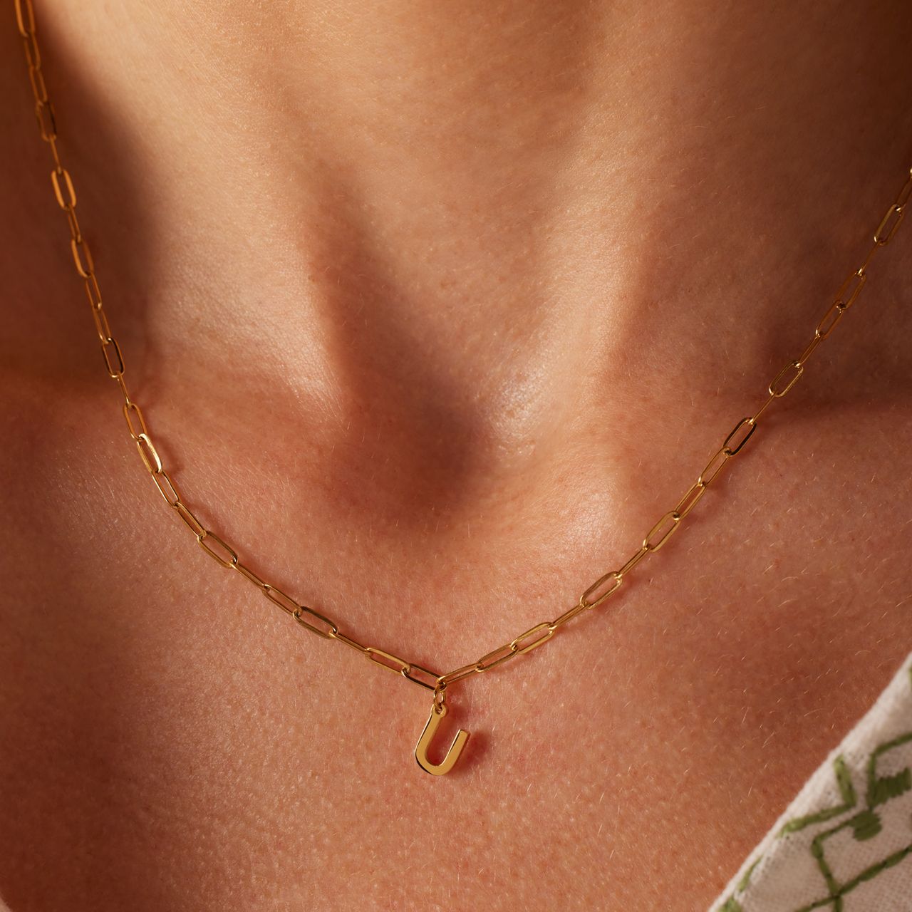 Stainless steel goldplated ketting met hanger letter U voor dames