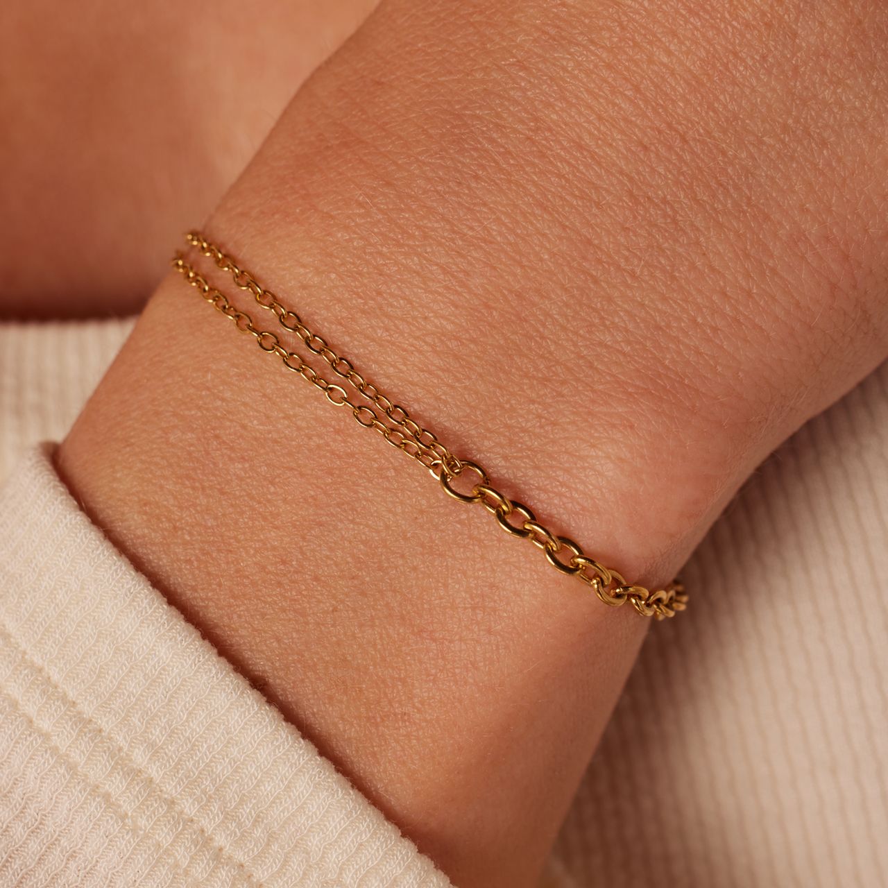 Stainless steel goldplated schakelarmband voor dames