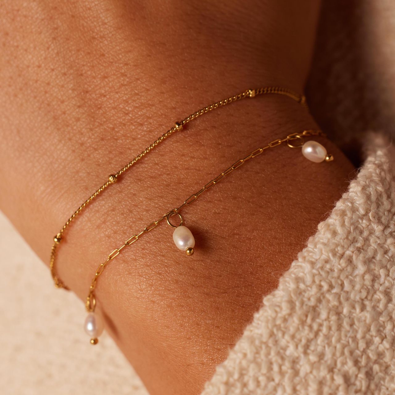 Stainless steel goldplated armbandenset met parel