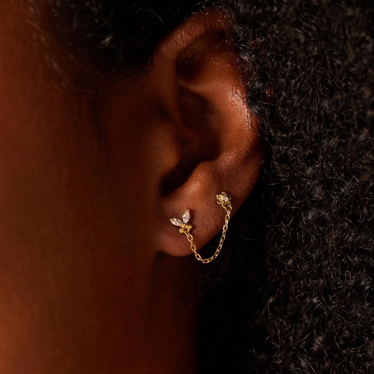 Zilveren goldplated oorknoppen dubbel vlinder met zirkonia voor dames