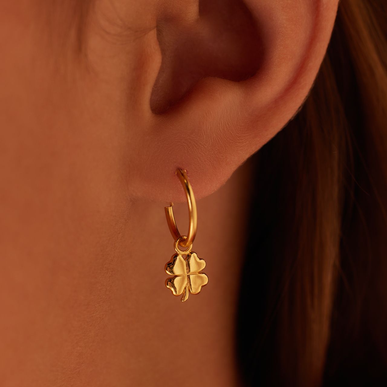 Zilveren goldplated kinderoorringen klavertje