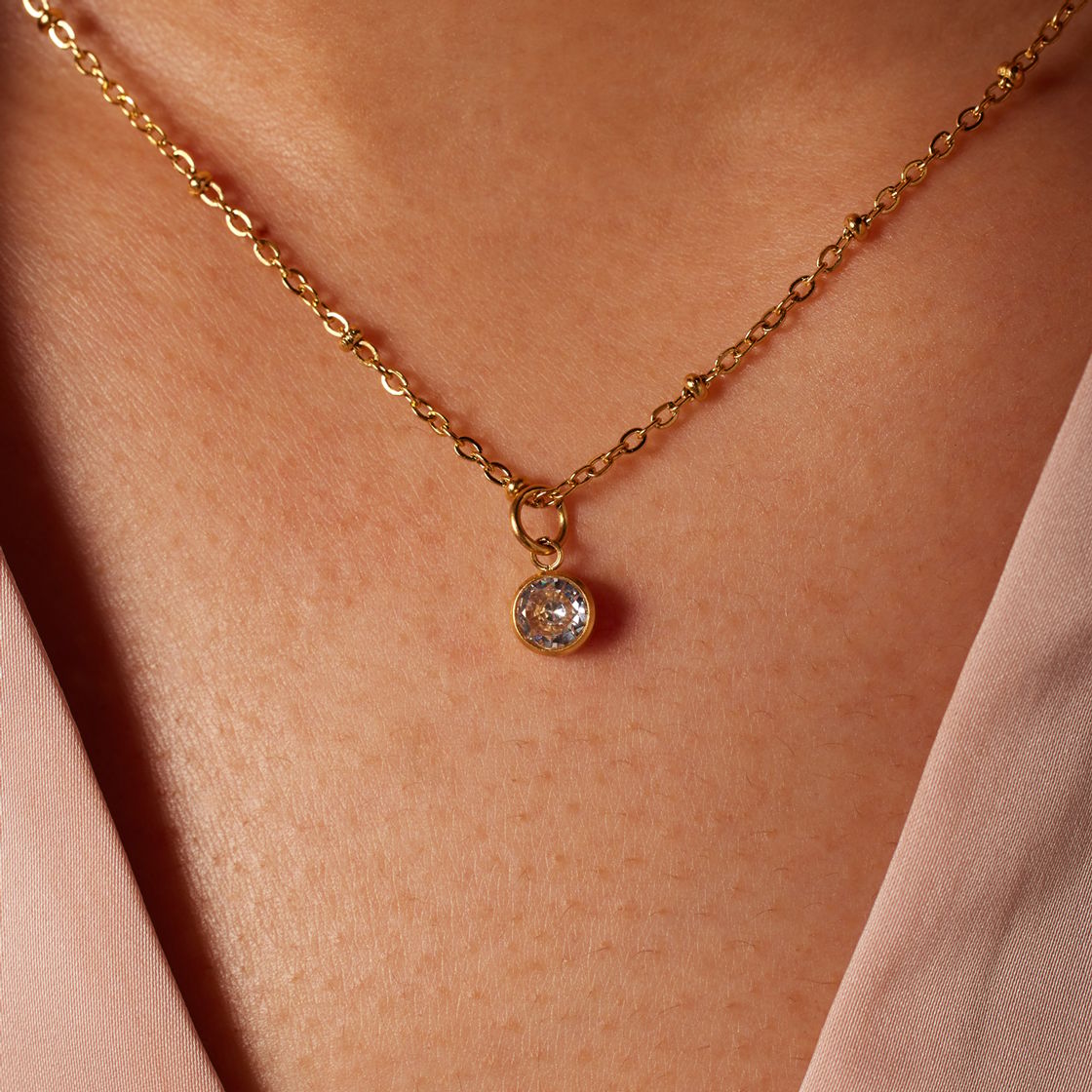 Stainless steel goldplated ketting met geboortesteen hanger April