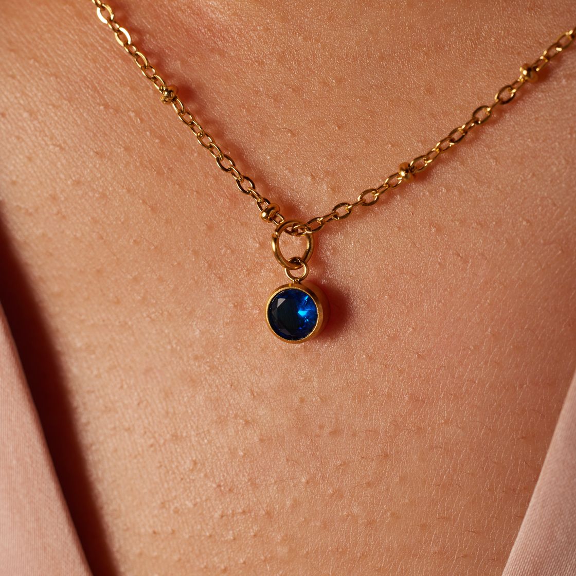 Stainless steel goldplated ketting met geboortesteen hanger December