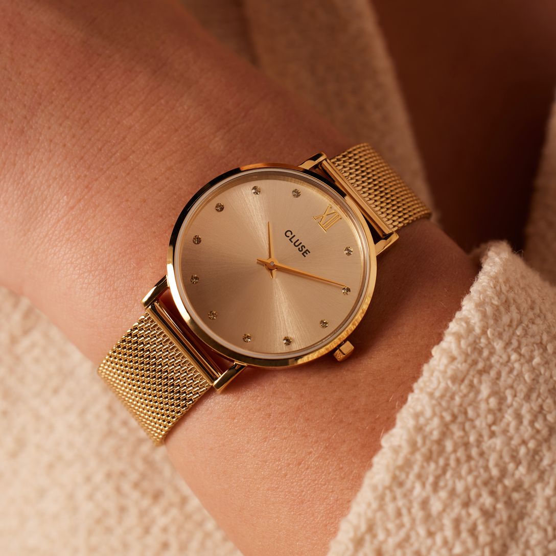CLUSE – Uhr aus der Minuit-Kollektion mit goldfarbenem Mesh-Armband und Kristallbesatz