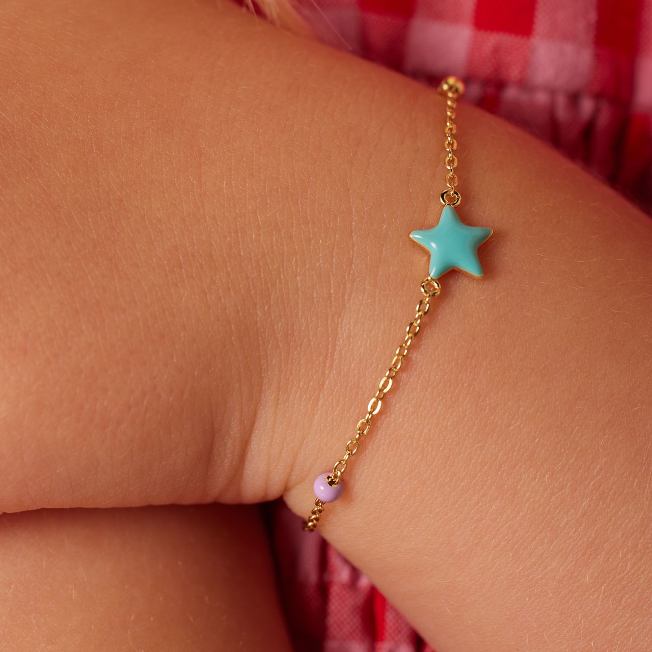 Zilveren goldplated kinderbedelarmband met ster met emaille 