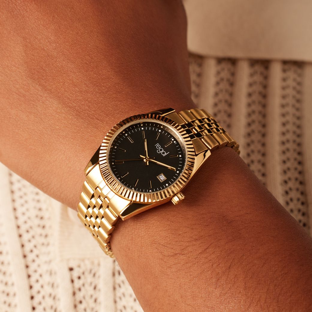 Regal horloge goudkleurig met zwarte wijzerplaat