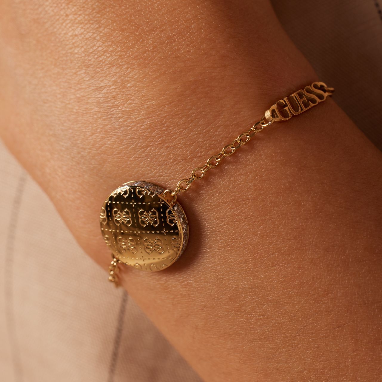Guess, Armband aus Edelstahl, vergoldet, 4G RISING