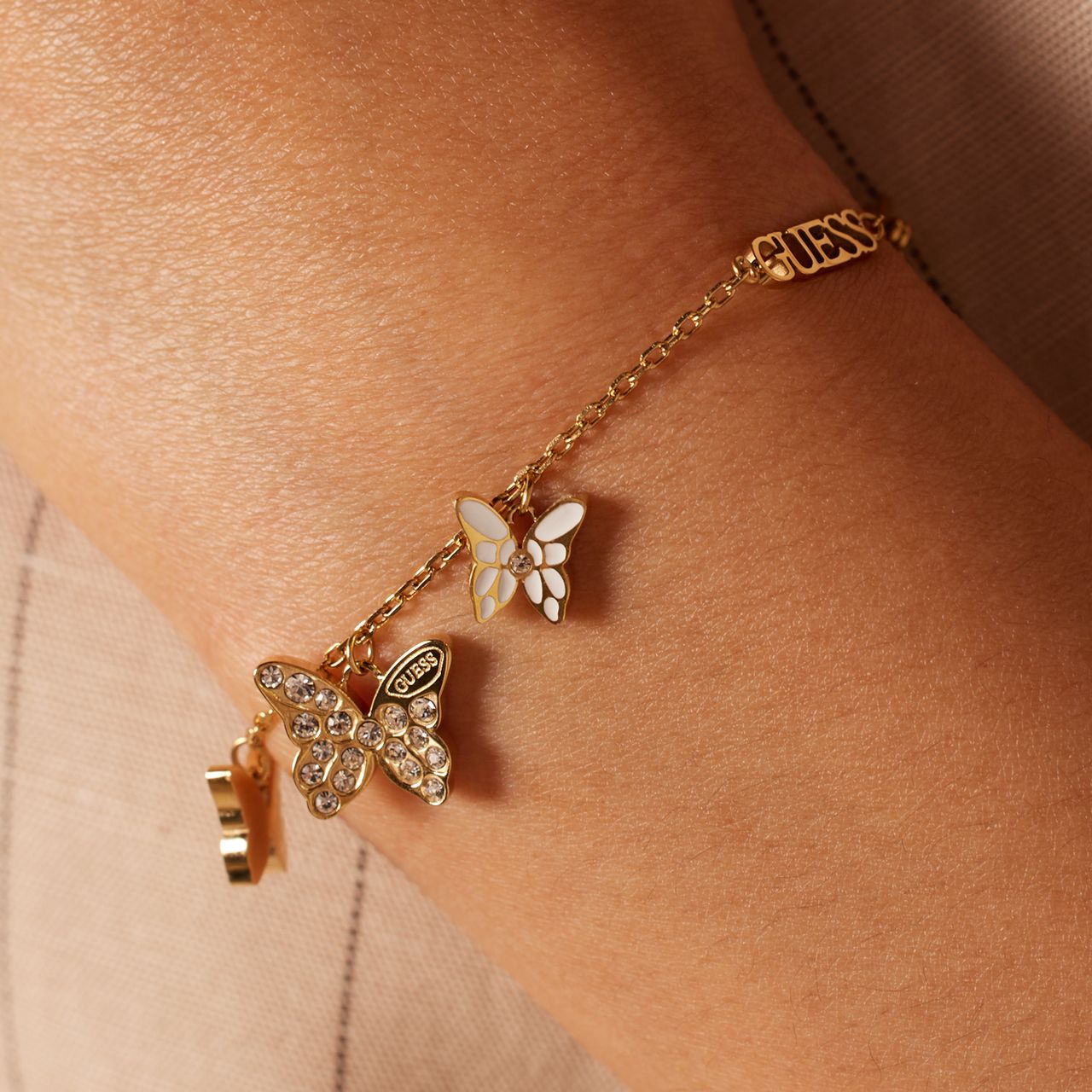 Guess stainless steel goldplated armband CHRYSALIS