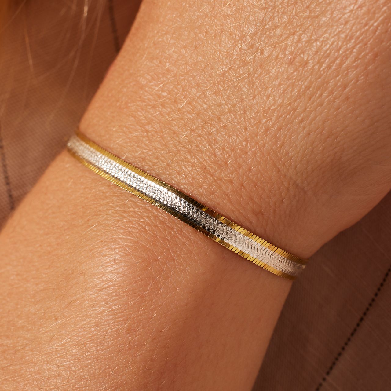 Zilveren bicolor slangarmband