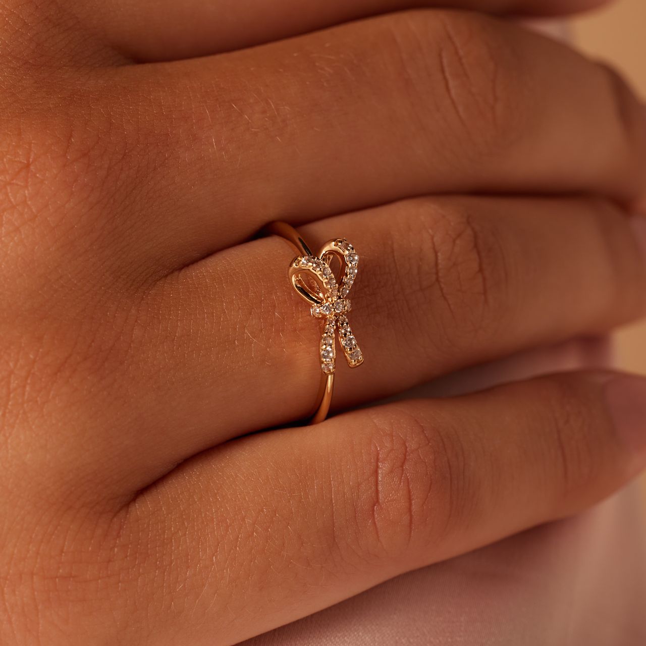 Zilveren goldplated ring strik zirkonia