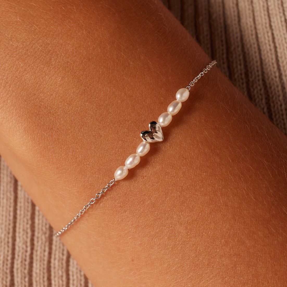 Zilveren armband hart met gratis oorbellen