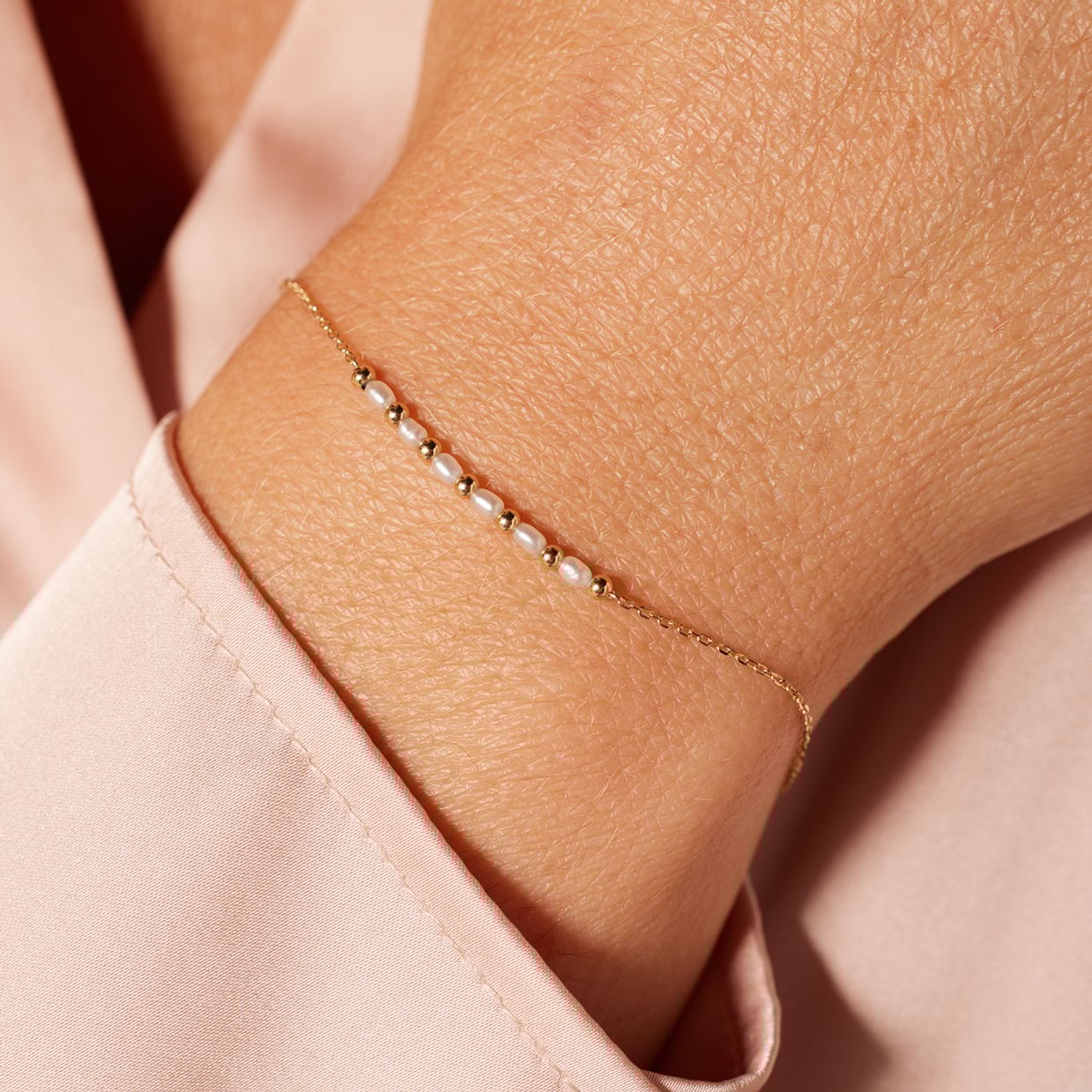 14 karaat geelgouden armband met zoetwater parels