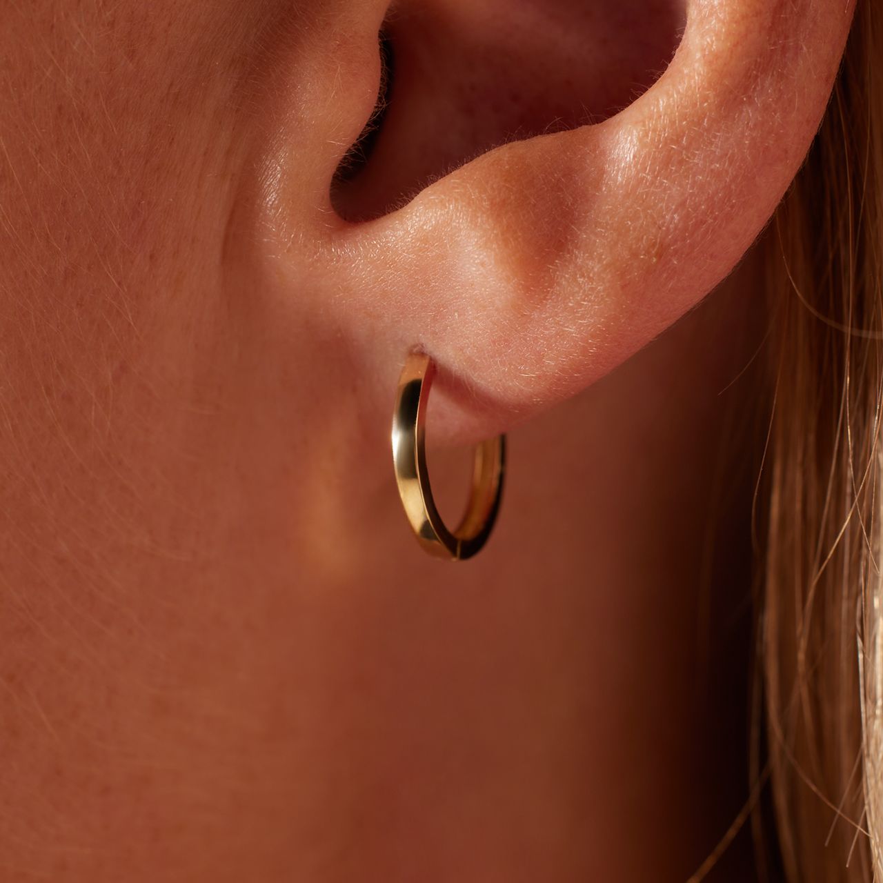 14 karaat geelgouden oorringen 14mm