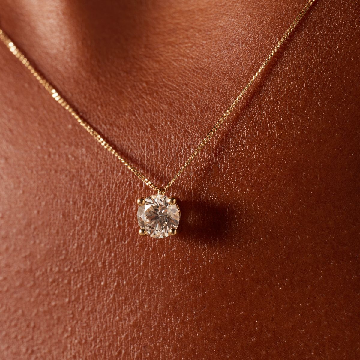 14 karaat geelgouden ketting met diamant 1ct