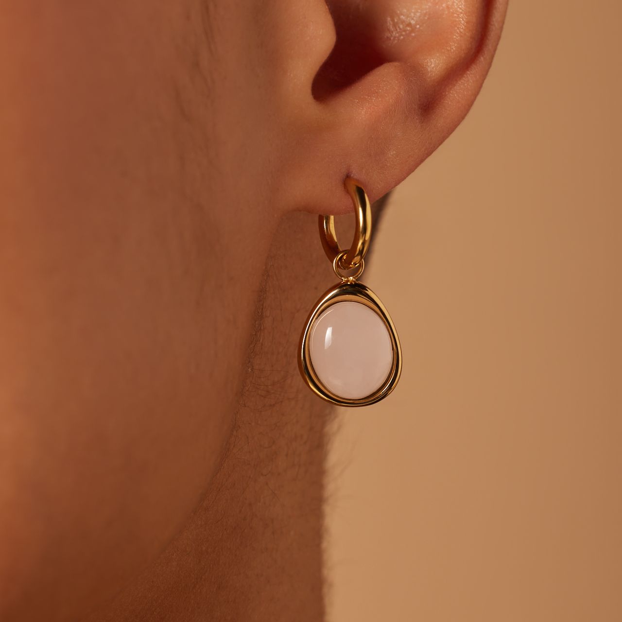 Ohrringe aus Edelstahl, vergoldet, mit Rosenquarz, oval