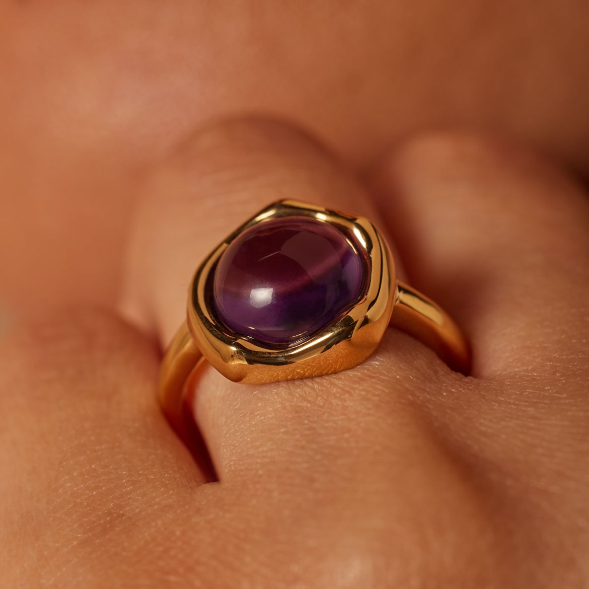 Stainless steel goldplated ring met amethyst