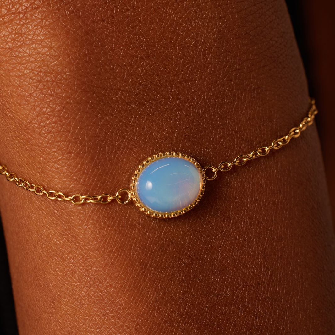 Stainless steel goldplated armband met opaal