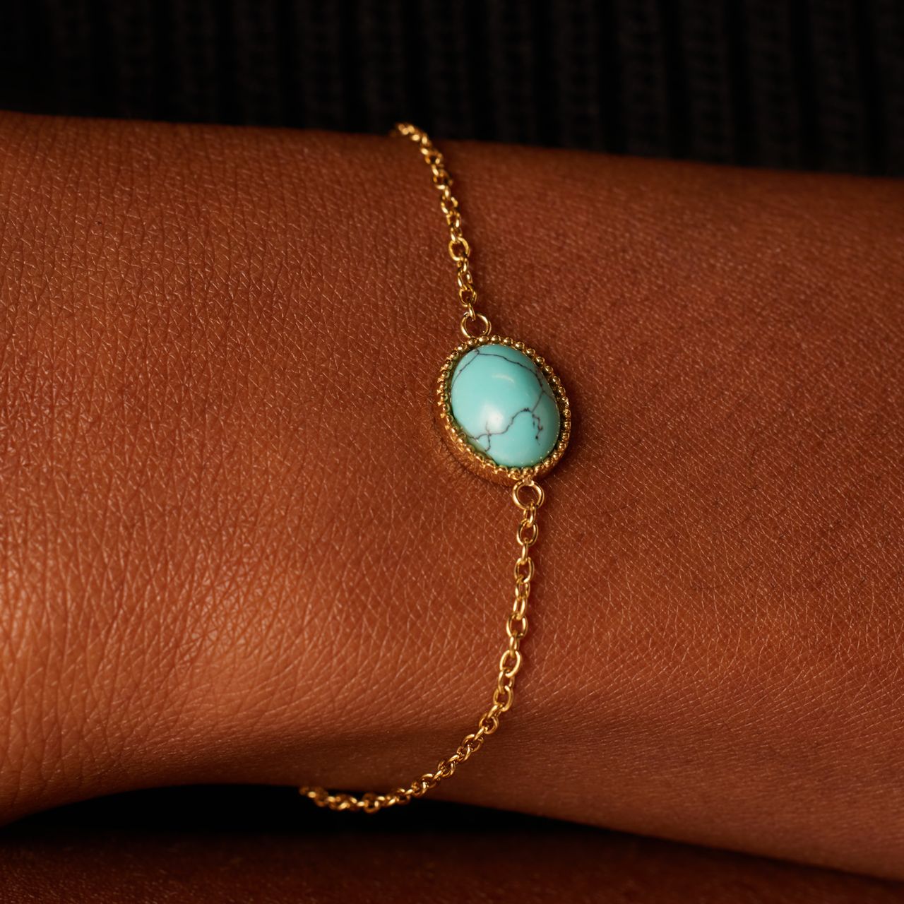 Stainless steel goldplated fantasiearmband met turquoise voor dames