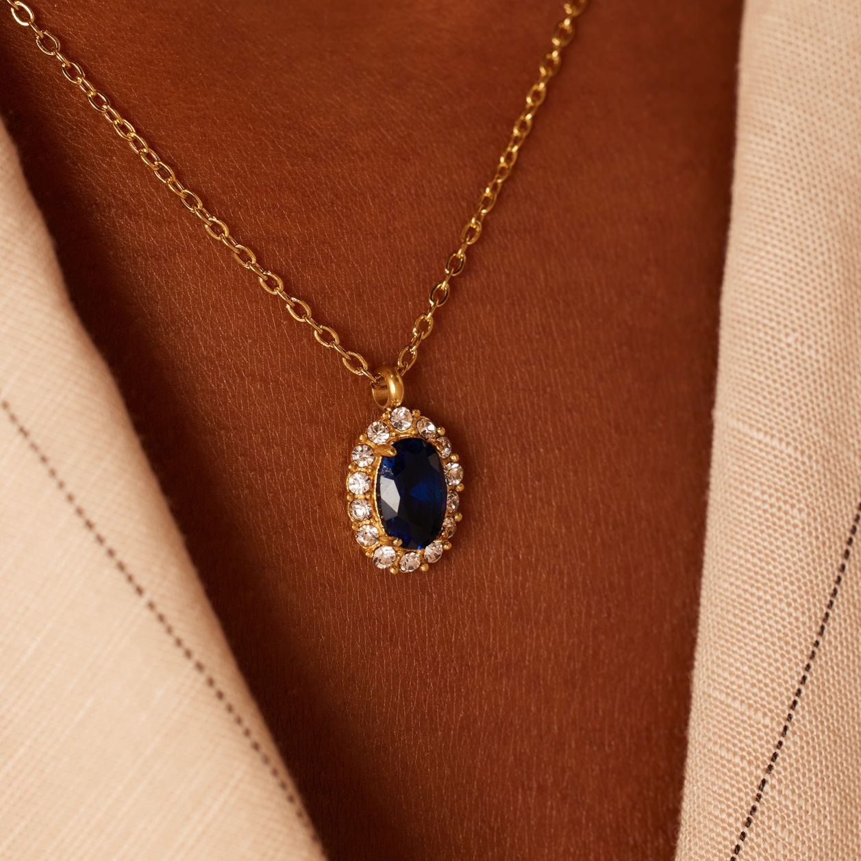 Stainless steel goldplated vintage ketting met blauw zirkonia