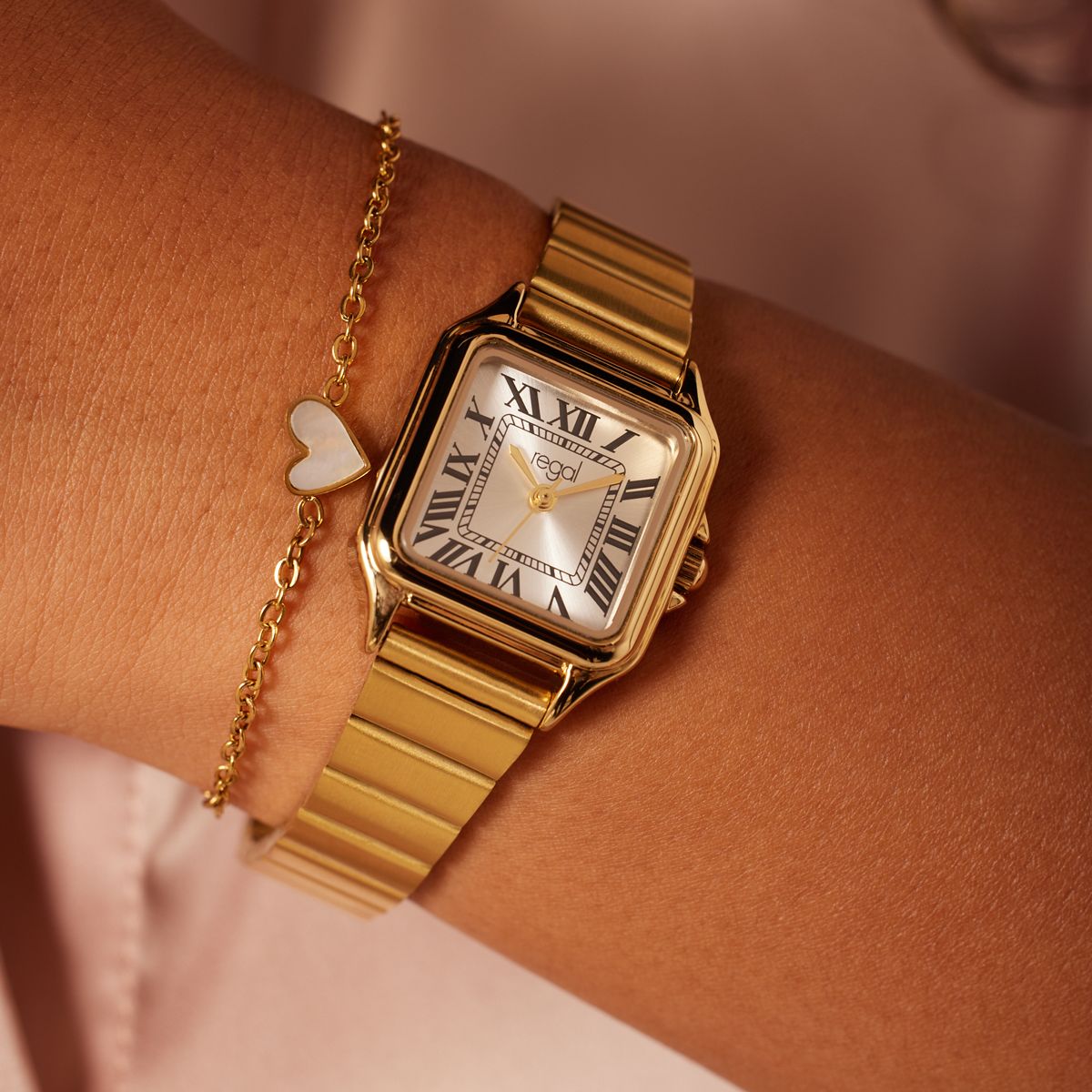 Regal goudkleurig horloge staal met gratis armband