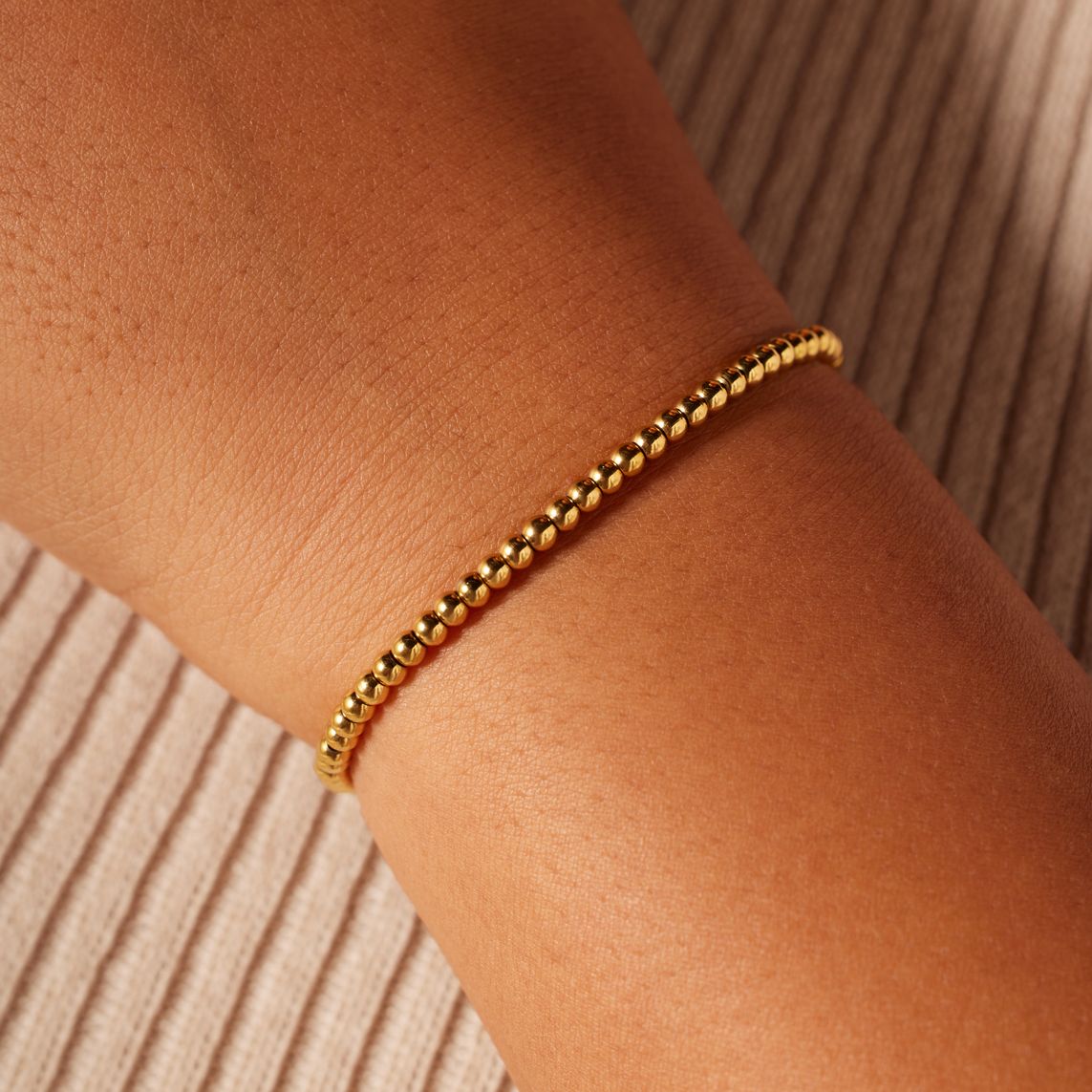 Stainless steel goldplated kralenarmband voor dames