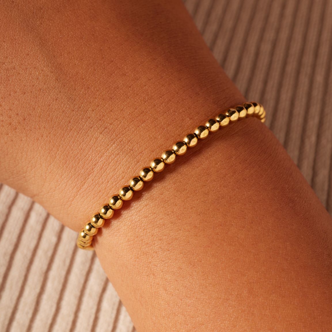 Stainless steel goldplated kralenarmband voor dames