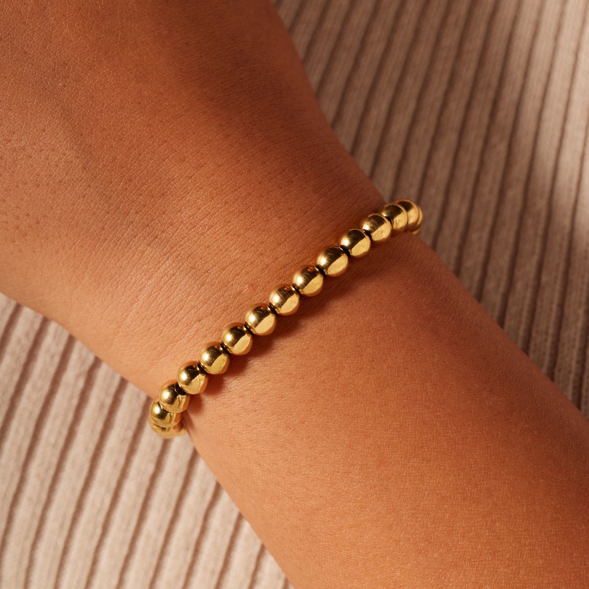 Stainless steel goldplated kralenarmband voor dames